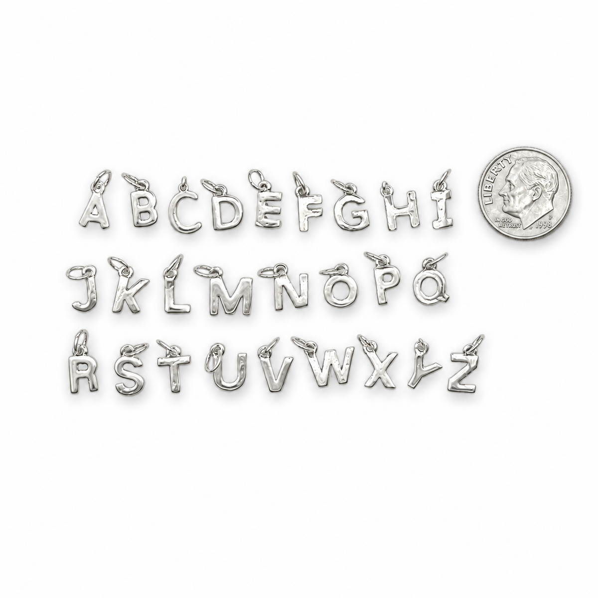 Tiny silver initial charms A through Z reference